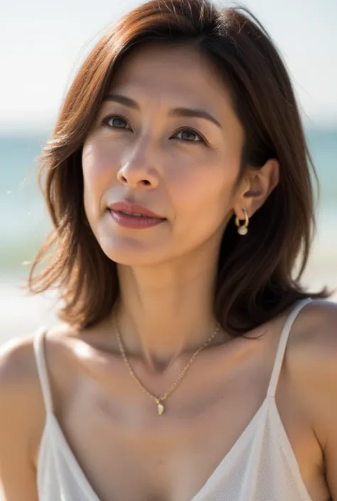 A stunning yet natural close-up portrait of a 48-year-old Japanese Hollywood actress enjoying a sunny day at the beach. She wears a loose, flowy white sundress, her hair naturally wavy and tousled by the ocean breeze. Her makeup is minimal, featuring a dew...