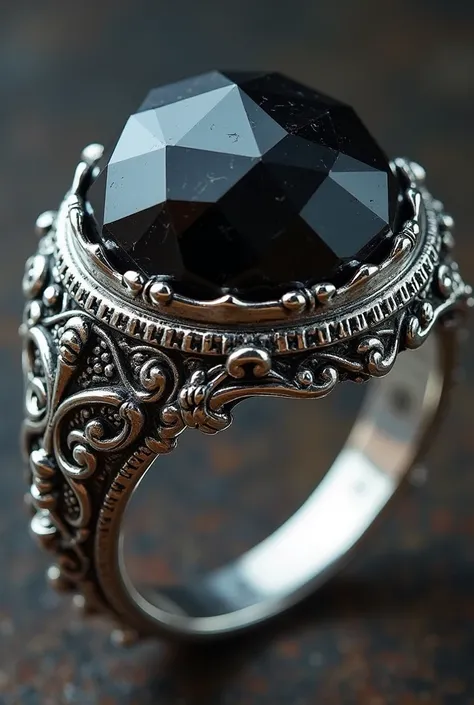 ornate silver and obsidian signet ring