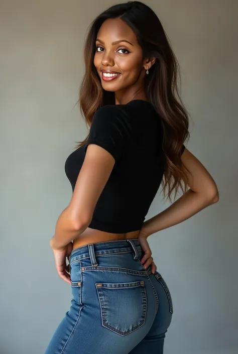 Smiling Beautiful lady wearing black t-shirt and jeans showing her butt