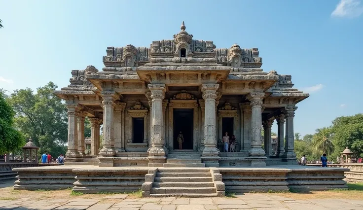 Image depicts an ancient stone temple with intricate carvings, showcasing traditional Indian architecture. The structure is primarily composed of gray stone, featuring detailed relief work and ornate pillars. The temple is set against a backdrop of lush gr...