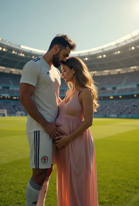 Soccer player with his wife who is 6 weeks pregnant 