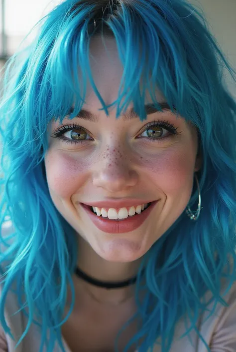 A pic of billi eilish with blue hair smiling at the camera 