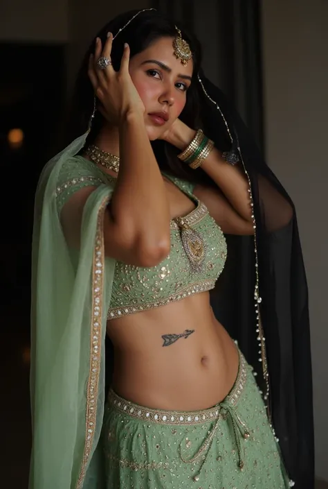 (masterpiece, best quality:1.2), She is draped in a low waist pastel green lehenga with delicate gold embroidery, giving her an ethereal, moonlit glow. Her black sheer veil barely grazes her bare stomach, fully exposing her deep navel and slim waistline. A...