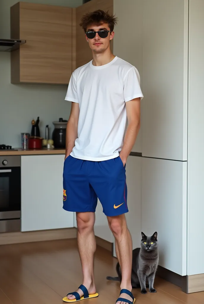 A 19-year-old man took a picture of me in the modern kitchen photo taken from afar, messy short hair with a white shirt in pajamas and blue shorts from Barça, modern kitchen, modern stove, wooden floor on the floor looking at me is a gray British cat. Athl...