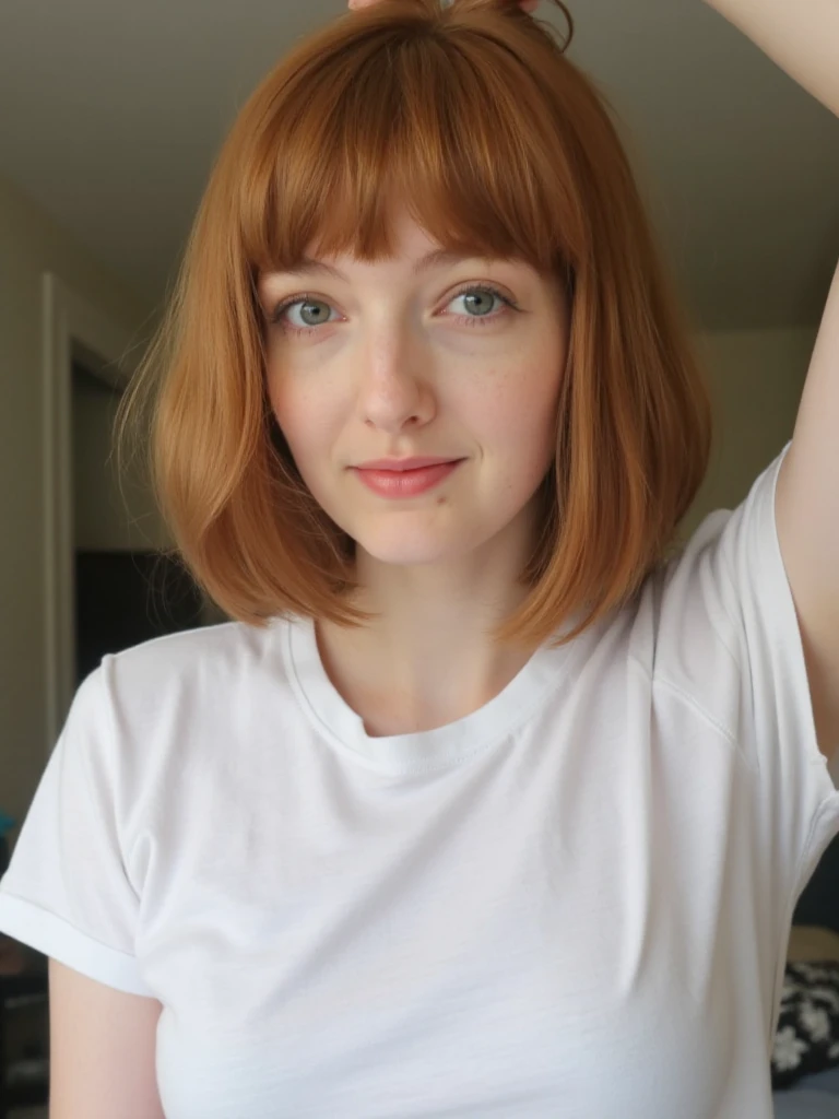 Redheaded woman bowl cut with fringe, white T-shirt, gagged, looking at the viewer 