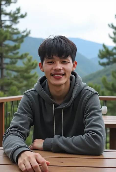 a 17-year-old medium-bodied Korean man wearing a hoodie, jeans, black and white carvil shoes, posing in front of the camera with the background enjoying the beautiful view of the mountains and lots of beautiful trees while sitting at a wooden table.