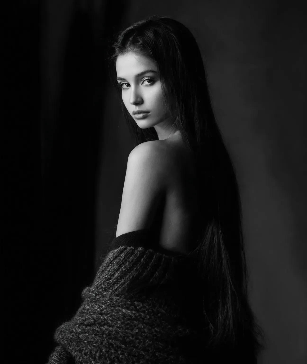 arafed woman in a off shoulder sweater, in black and white, young woman, very long straight hair to her waist