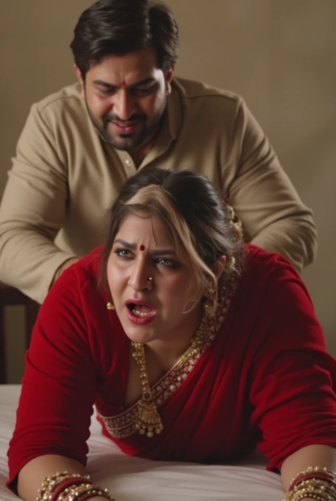 An Indian woman with medium plus size body, thighs visible in saree, busty breasts , bends over in bed and crying loudly with pain  and her drunken husband is standing behind her, pushing her hard and laughing background blur