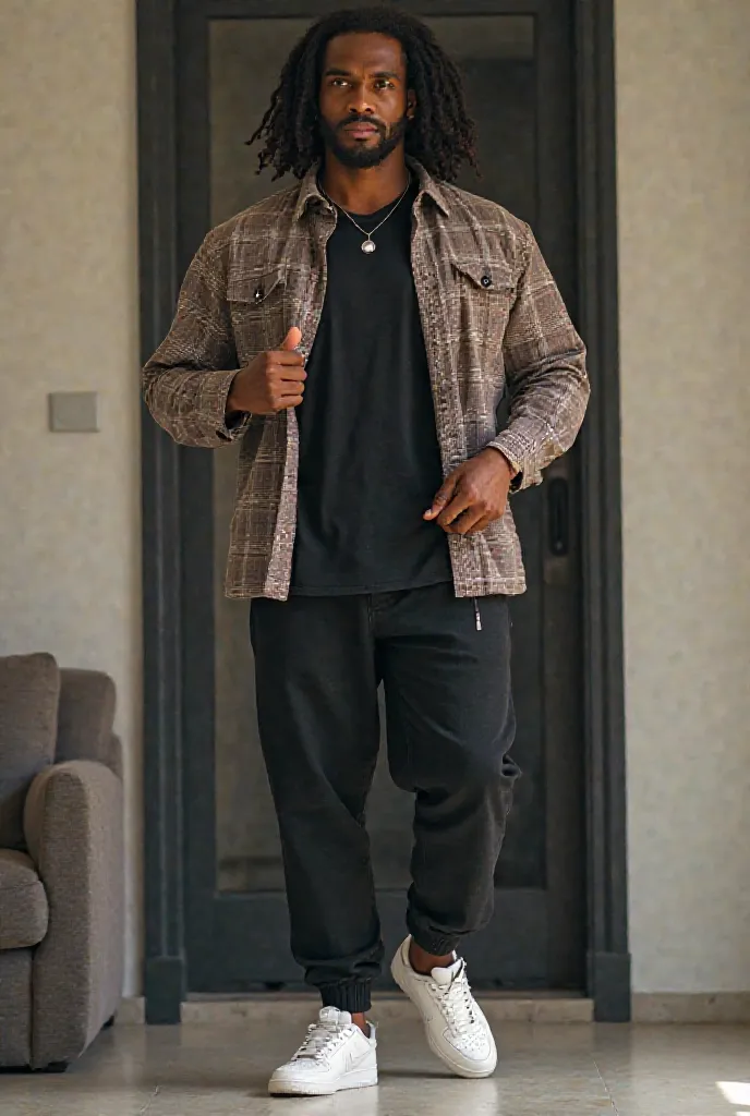 Black man with long curly hair putting on a checked shirt with a black plain t shirt with a black baggy jeans with air pod and white air force ones 