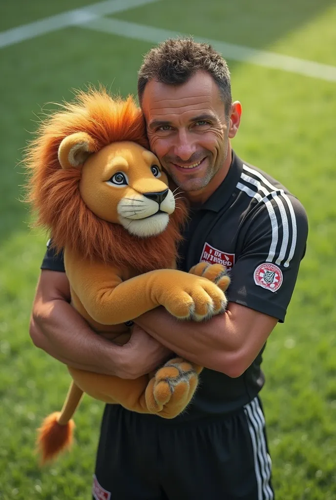 Image of a referee carrying the lion from Sportig Clube de Portugal in his arms