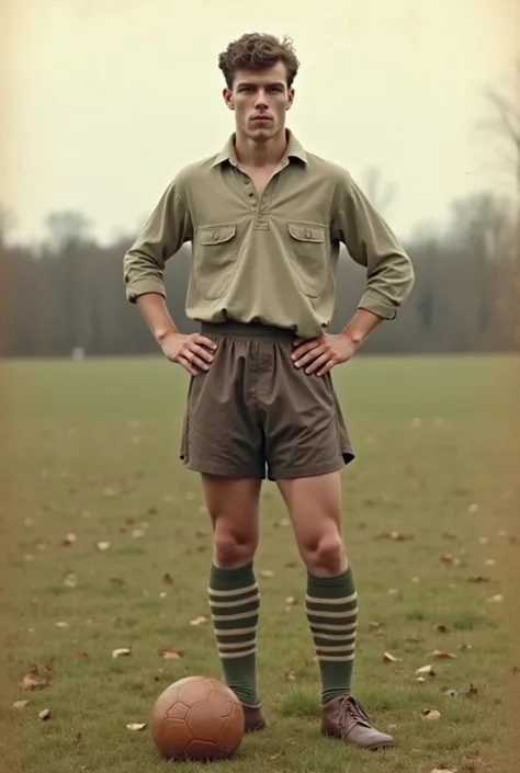 "Full-body portrait of a male soccer player standing on a grassy field, wearing a vintage soccer uniform from the early 20th century. The uniform consists of a long-sleeved collared jersey, loose-fitting shorts, knee-high socks with stripes, and classic le...