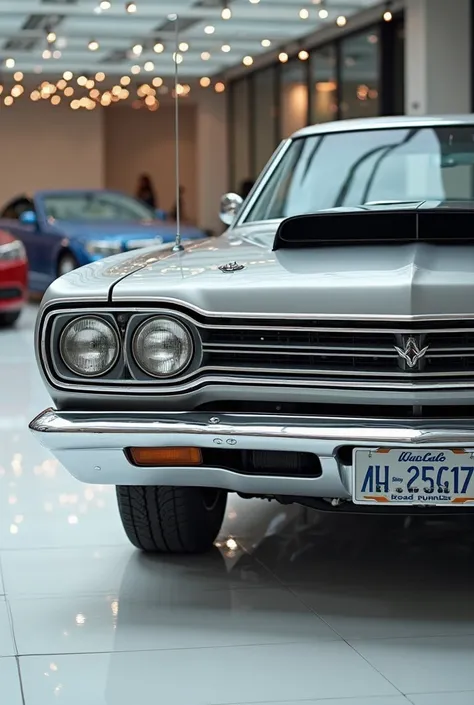 Close ( put here fron )view of painted  (colour silver) with shiny clour (Plymouth road runner )sleek in large shape sedan in large size with  (Plymouth road runner )  logo on its large detailed grille in shiny( silver)color  with angular sporty design cap...