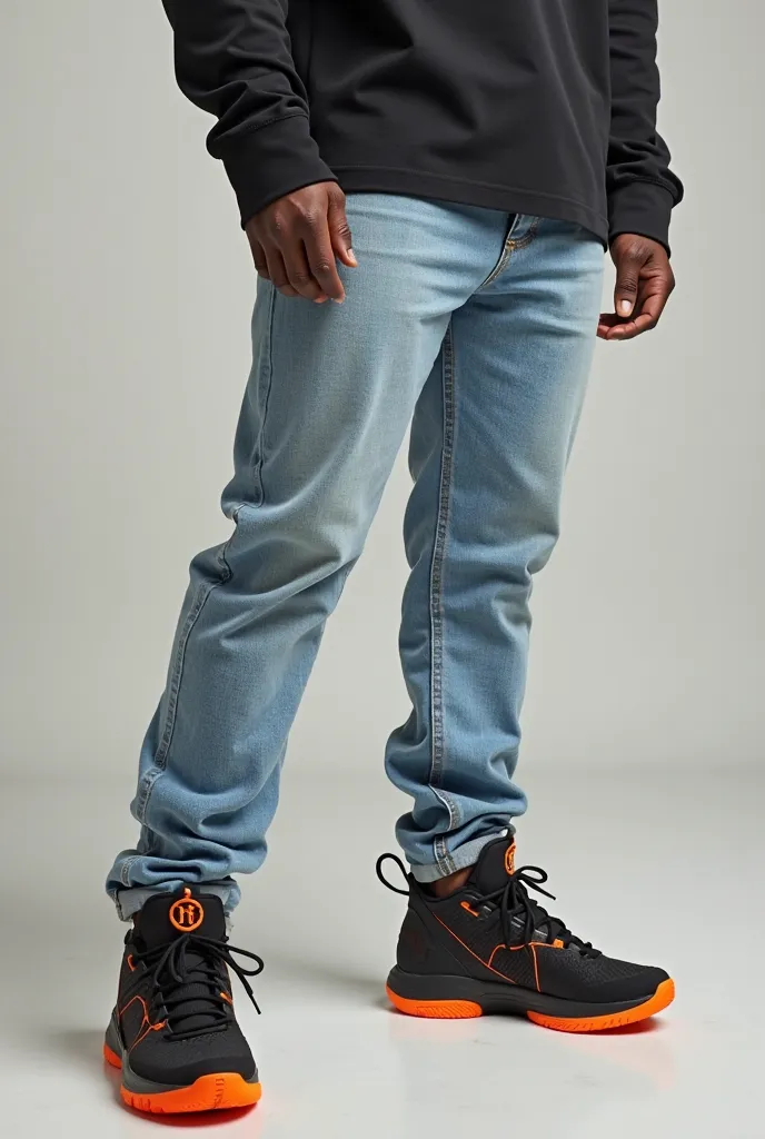 Picture of a human wearing shop lebron 19 XIX( orange  sole own)shoe with light blue jeans with black long sleeve t shirt