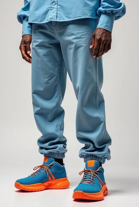 Picture of a human wearing arch color lebron 19 XIX( orange  sole own)shoe with light blue jeans with light blue dress shirt 