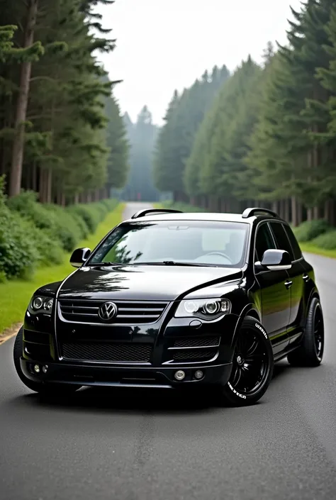 Wolksvagen touareg 2005 in a beautiful black body kit 