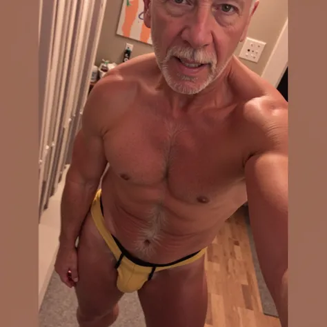 Handsome older man in swimsuit 