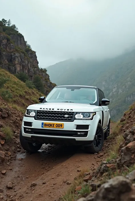 "A white Range Rover with yellow license plates displaying the bold name 'BHOKEE 009' climbing a steep mountain. The scene features rugged terrain, patches of greenery, and an overcast sky, creating a moody and dramatic atmosphere. The vehicle is shown in ...