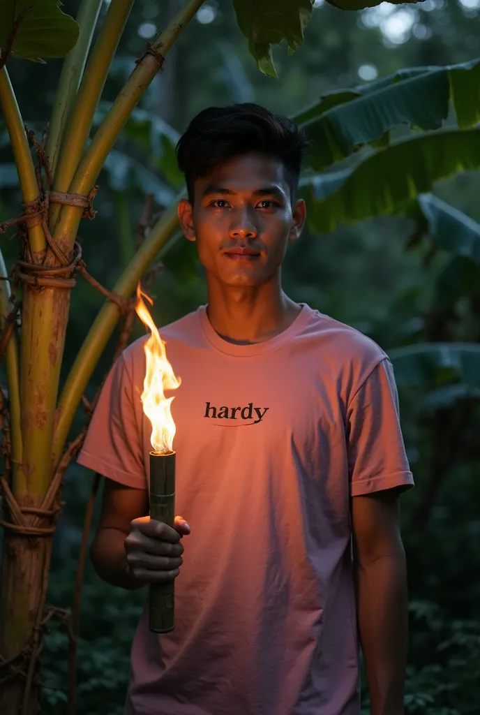 Make a photo of a young Indonesian man, with a slightly filled body, , 20 years old with a clean and handsome face, wearing a pink t-shirt that says " hardy"is standing next to a banana tree with a scared face,and carrying a bamboo torch, at night , very r...