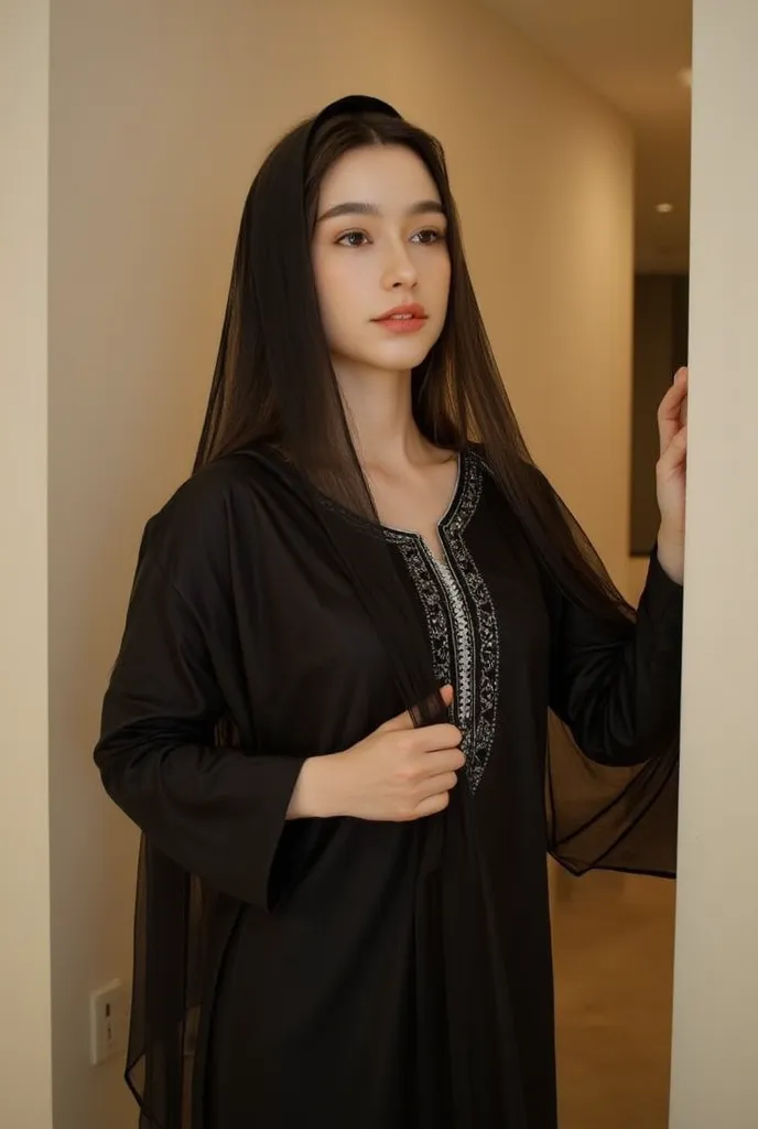 A radiant Korean beauty proudly wears a satin silk black Punjabi-style kurti adorned with intricate embroidery, paired with a flowing dupatta wrapped elegantly around her head. Her bright smile illuminates the frame as she confidently poses in front of a s...