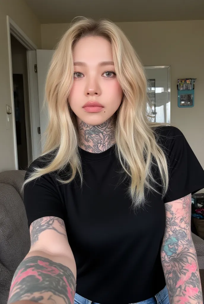 Long hair, very light blonde, a lot of tattoos, posing, selfie pov, cute grumpy face, large and big black t-shirt.