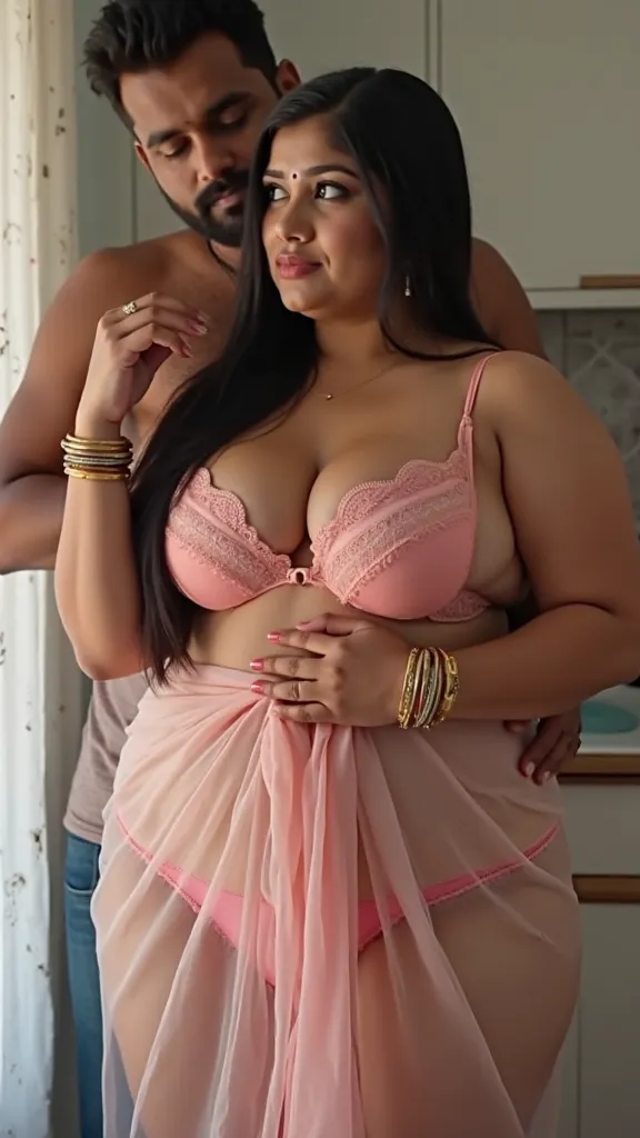 Beautiful tamil plus size woman in pink lingerie standing in kitchen   , a  boy hugging her from back side ,pressing her breasts , she is wearing  a transparent bath towel over the bra and pantie , bangles in hand, hand raised and put it in head, big breas...