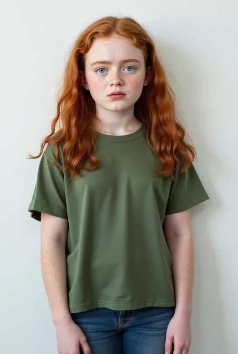 sadie sink is standing in front of a white wall, sad face,  ginger hair, wearing a baggy green t-shirt, small breasts, plump pear shaped body, thick hips, wearing jeans, shy girk, face of sadie sink, freckles, age 12, white backdrop, wide hips