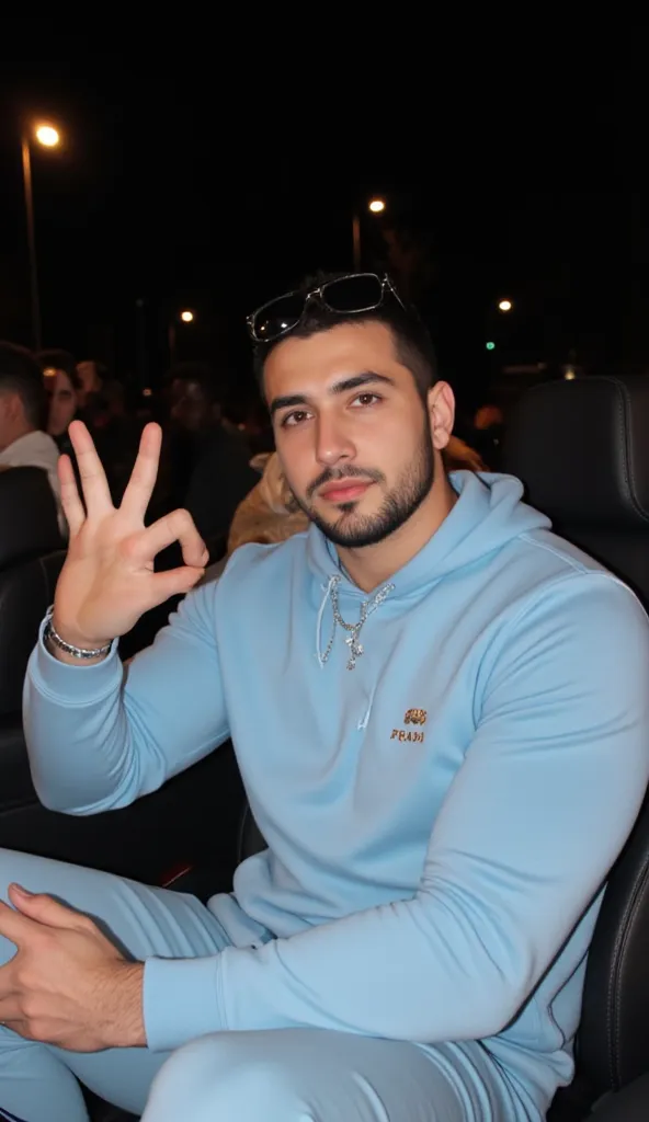 a handsome young turkish guy with muscle, dark very short hair fade middle parting and goatee beard  he wearing a light babyblue hoodie and a joggingpants in light babyblue and a and a thin silver chain and a small prada sunglasses is on his head  he is in...