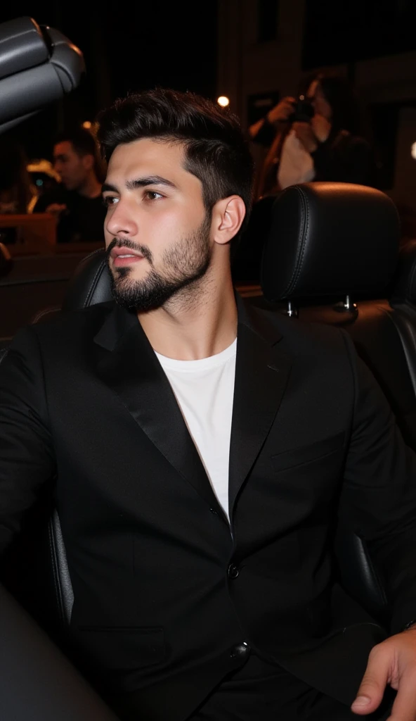 a handsome young turkish guy with muscle, dark very short hair fade middle parting and goatee beard  he wearing a black suitjacket and white shirt and he is in a cabrio car with black seats he driving amateur photo random picture and location is germany he...