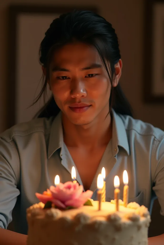 Please make a super realistic photo of a 30 year old Indonesian man with very long straight hair tied over his shoulders at night with an anniversary cake in front of him