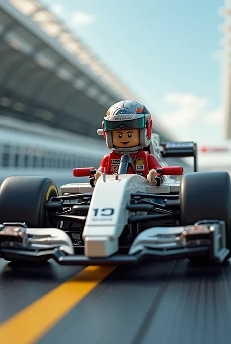 Lego Lewis Hamilton driving his Formula 1 Mercedes car also made of Lego