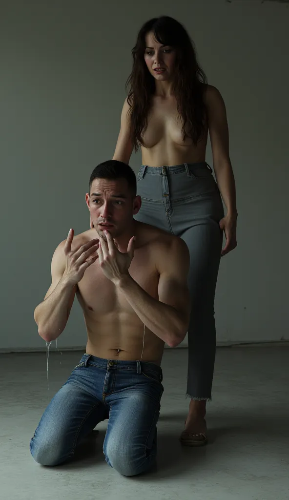 average looking man in jeans standing. wicked Female dominatrix standing facing him, looming over him. Man peeing his pants, man peeing his jeans, man crying.