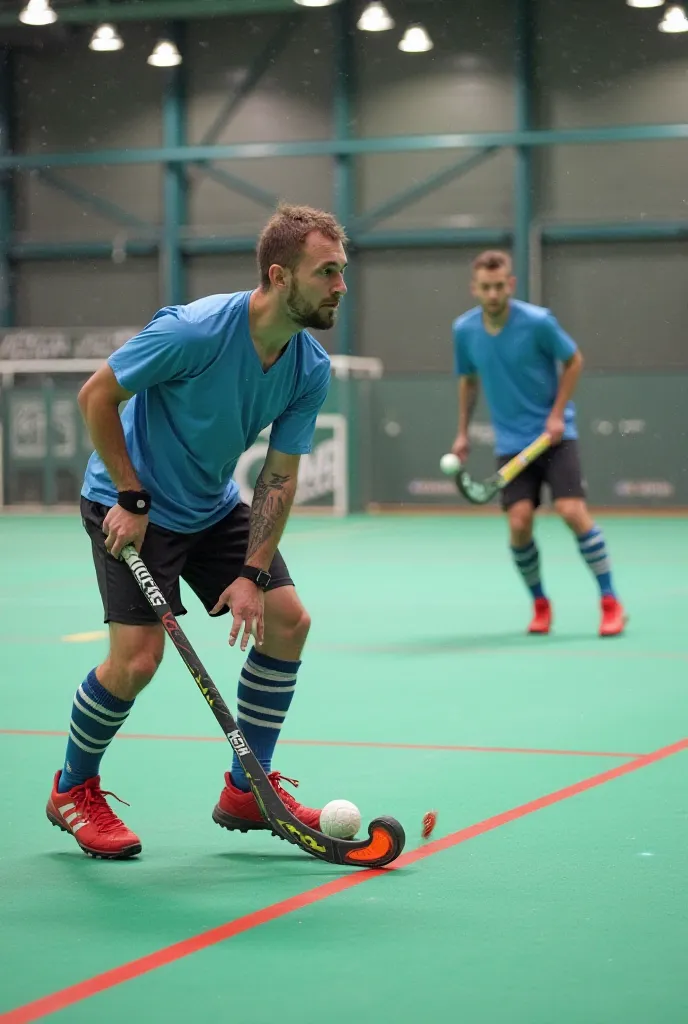 An image that clearly represents the following indoor hockey exercise
Push and control with scrolling:

Stand about 5 m from
range 
Pass the ball with a push and
after each pass, move
a few steps to the side before
Receive again
OBJECTIVE: Improve the pass...