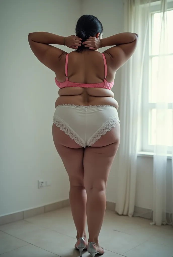 45 aged indian house maide , poor women,plus size,white skin,black and gray hair, low bun hair style, wearing  pink lace bra and white satin lace panties, silver heels,she is posing photos viewer, full length body image,both hands are tied together in  bac...