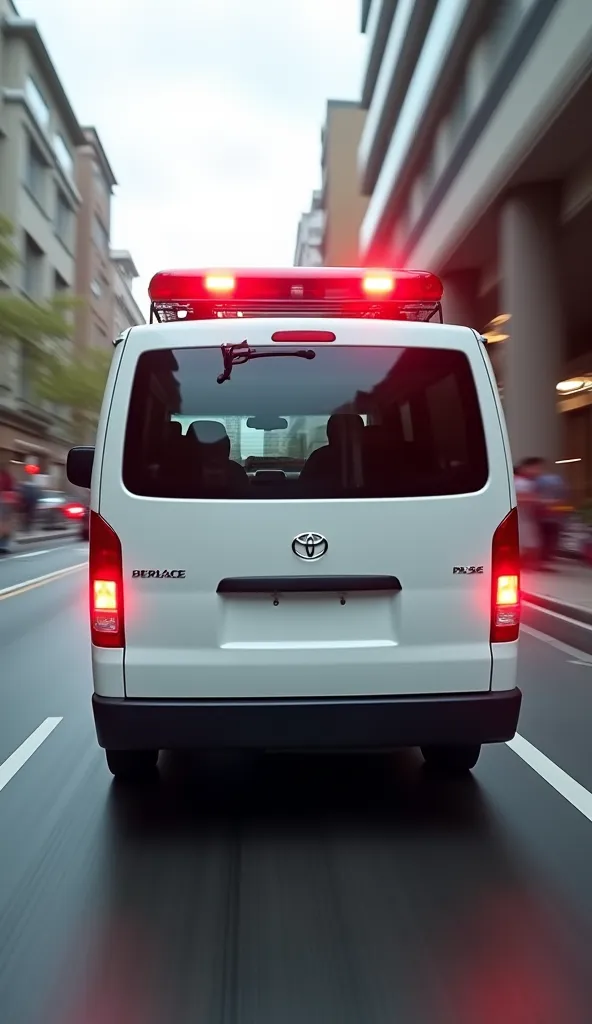 Ambulance seen from behind　Red belt　red siren is attached to the white Hiace