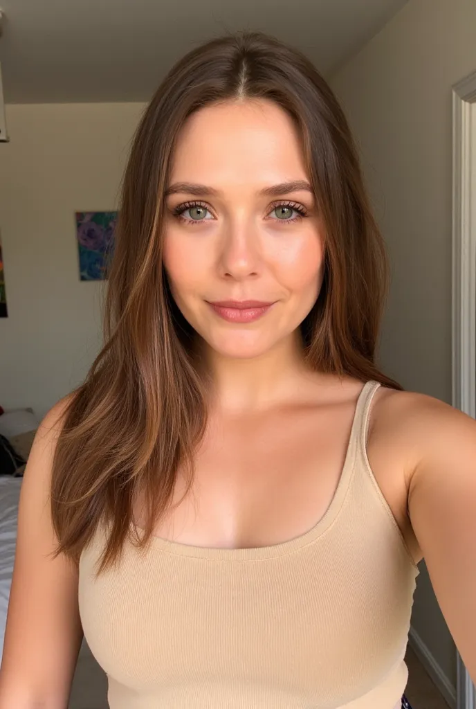 Selfie of a woman with long brown hair wearing a beige tank top, indoors, bedroom, subtle smile, 