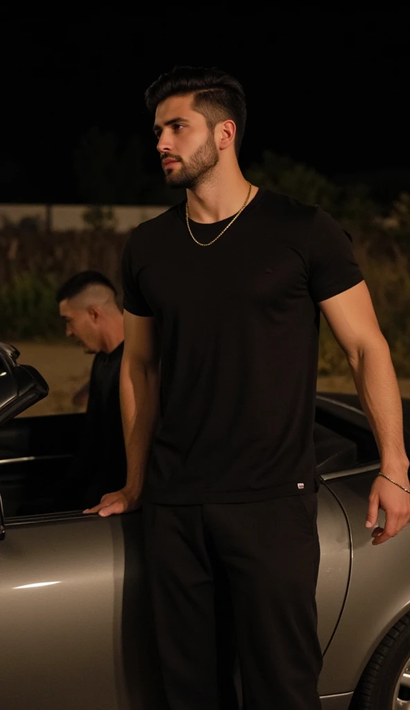 a handsome young turkish guy with muscle, dark very short hair fade middle parting and goatee beard  he wearing a black tshirt and a  black loose pants and a thin gold chain he is in front of a car Amateur photo random picture and location is germany he ha...