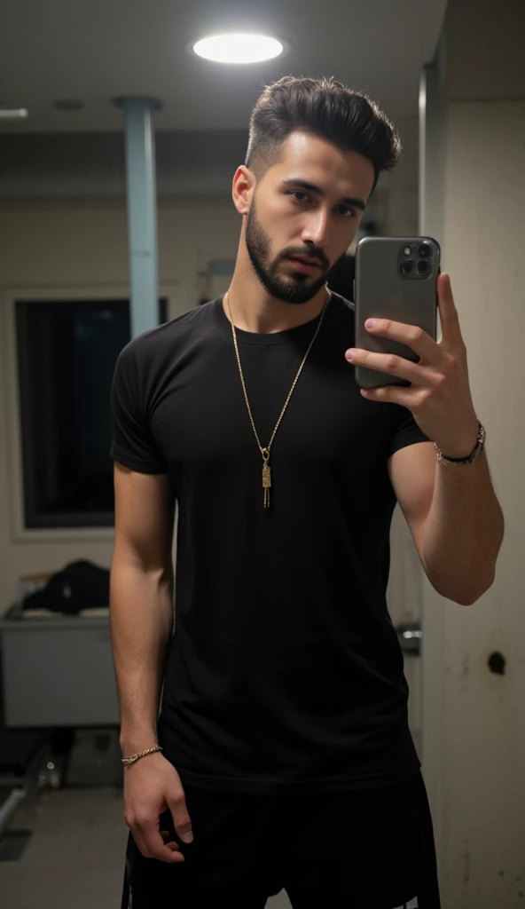 a handsome young turkish guy with muscle, dark very short hair fade and goatee beard  he wearing a black tshirt and a  black joggerpants and a thin gold chain he is in front of a mirror he is in a gym changingroom Amateur photo random picture and location ...