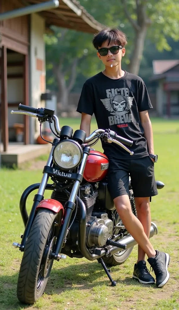 A age boy of Southeast Asian ethnicity is leaning against a custom-modified Honda motorcycle. He is positioned slightly off-center to the right of the image. He is wearing black sunglasses, a black t-shirt with a graphic design, black shorts, and a wristwa...