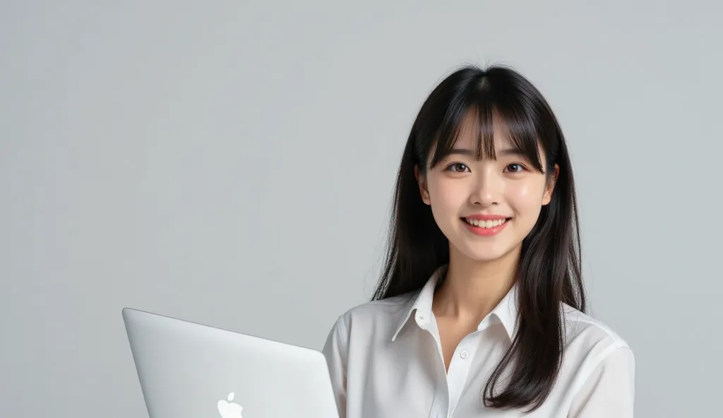 An image of a happy Korean woman holding a Macbook,  gray background