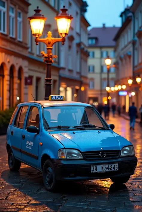 The tight blue Opel Meriva A taxis from 2003, city of Opole. The inscription on the Opole lamp. 