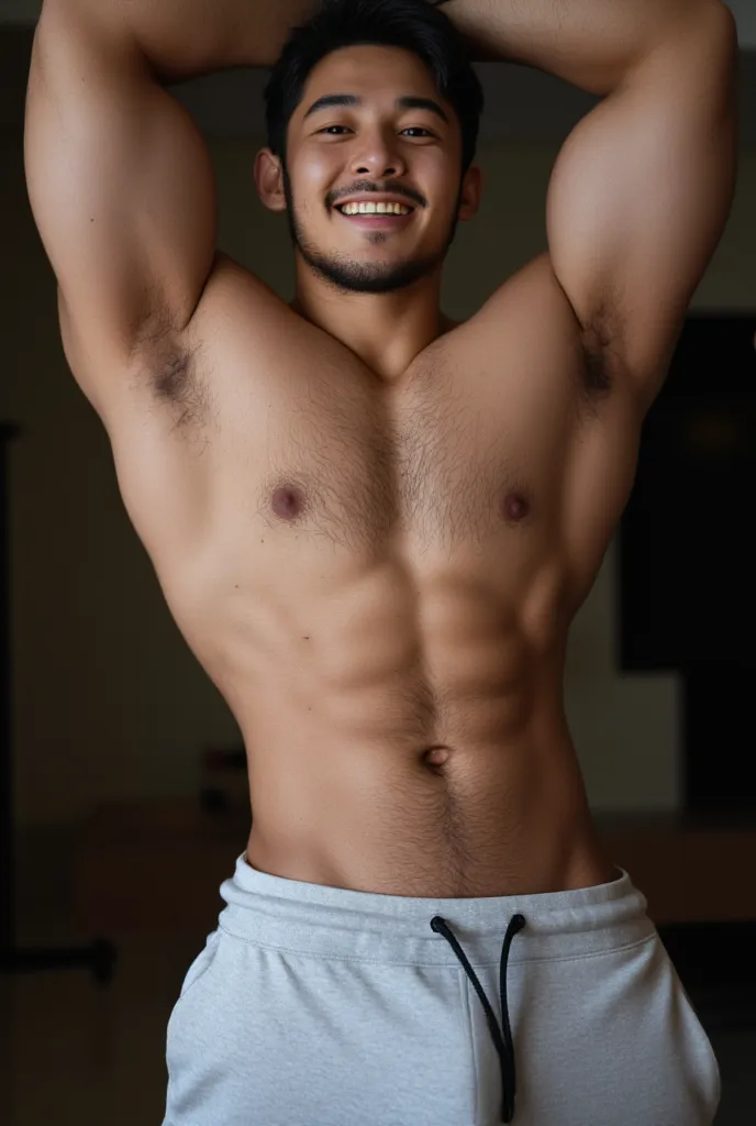  Happy Latino man in his 20 year old athletic man naked hairy , Wearing gray jogger with a big bulge erection (male pectorals and wide and rounded) ,standing in the room , sweaty body, Arms up 