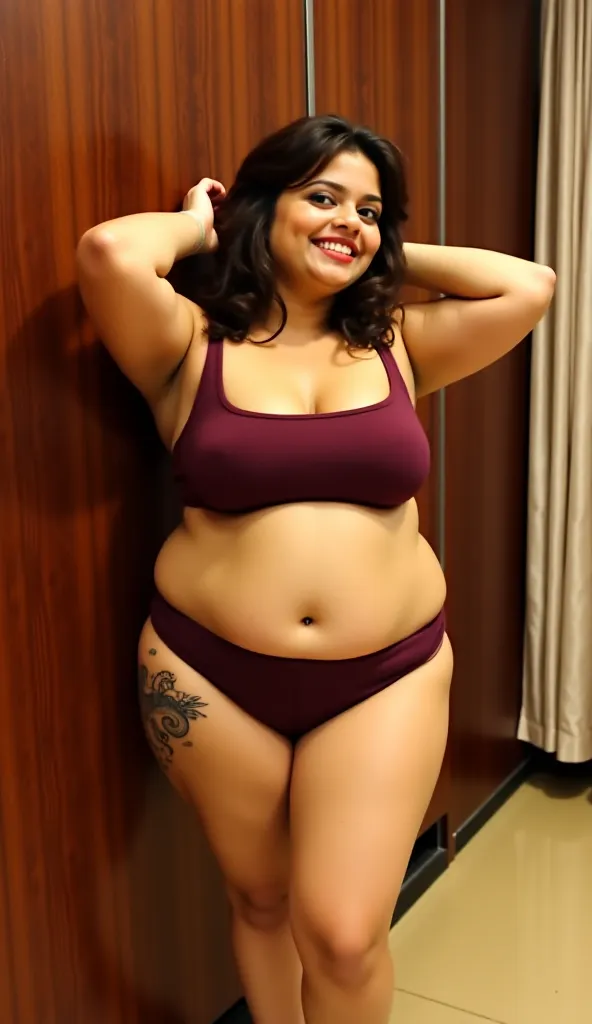 The create Indian desi bhabhi fat girl bikini 👙 A young woman of South Asian ethnicity, positioned slightly off-center to the right of the frame, is seen from mid-thigh up.  She is leaning against a wooden wall. She has medium brown hair, and a light brown...