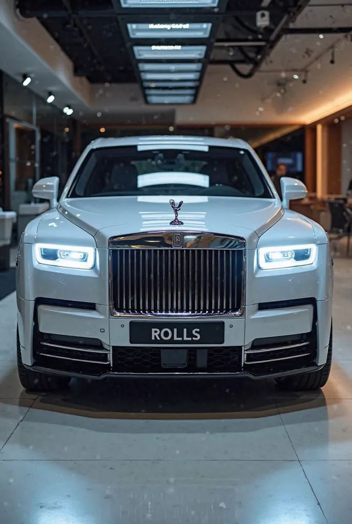 (white) front view ( 2025 Rolls Royce -) in the showroom . the front plate reads "( Rolls ) view highlighted.