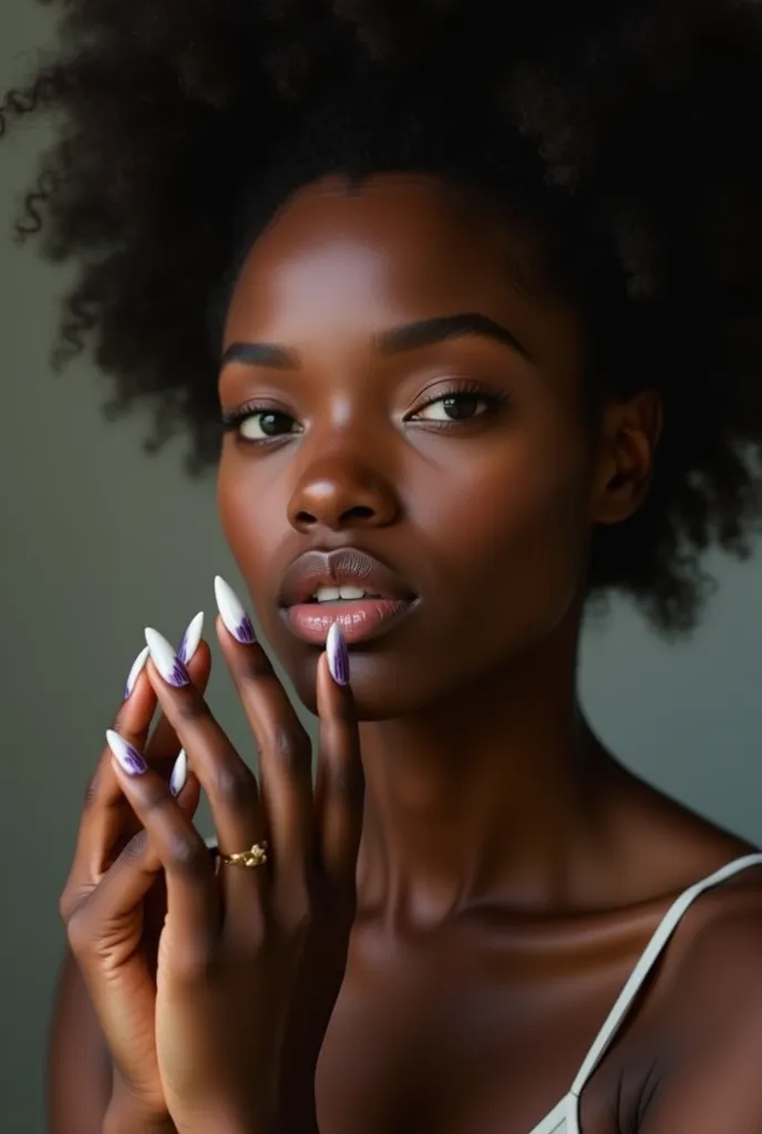 Black woman with ballerina-shaped nails