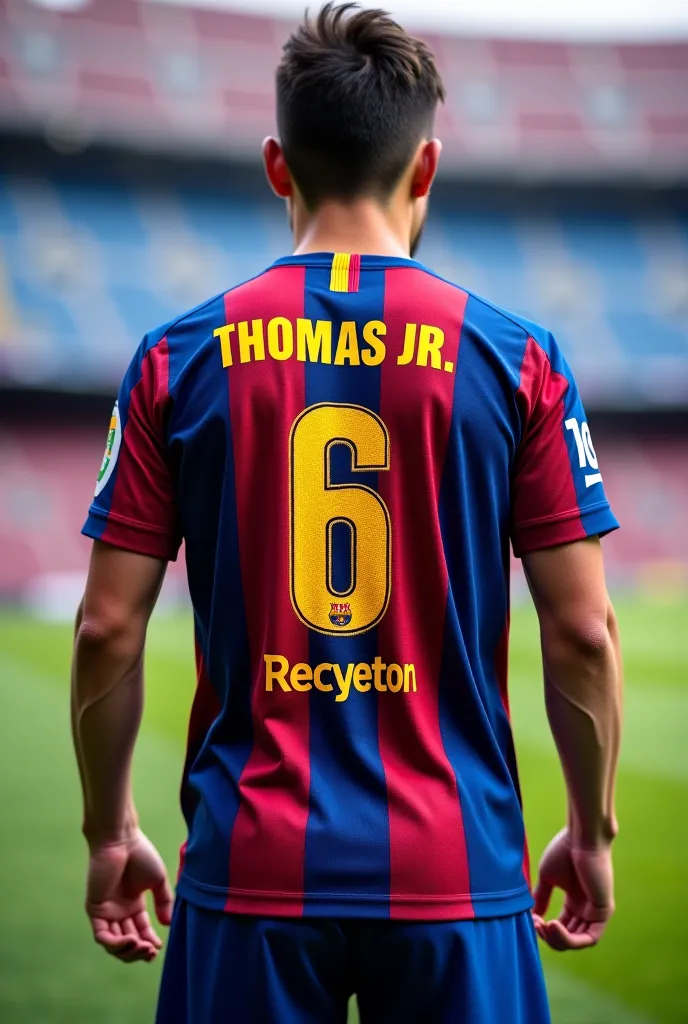 A Barca jersey from behind writes Thomas Jr. with the number 6