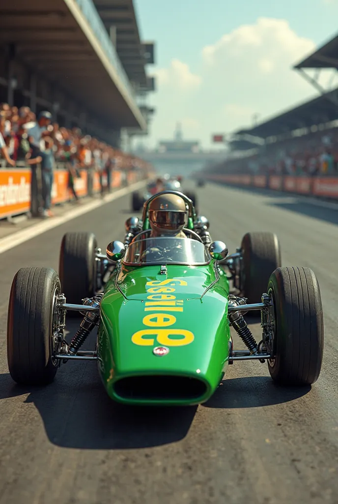 A green Formula 1 car from the 60s that has the words: ROSS RACING in yellow