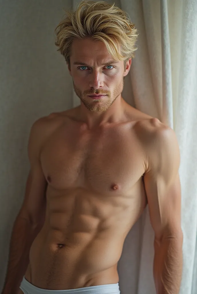 Blue-eyed blond man wearing underwear only