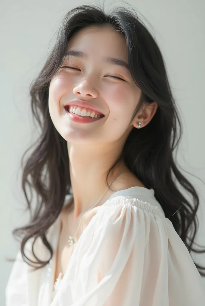 A girl without boobs on a white background in a simple white blouse. She looks up. She smiles very widely. Her eyes are closed. Her hair is long black. The hair does not fall on her face. 