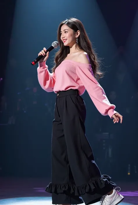 Beautiful young Korean girl is dancing at the stage wearing A delicate pink long-sleeve top with open shoulders, adding sophistication. The top looks comfortable thanks to its soft fabric, possibly cotton or knit. The black pants have wide, loose legs ador...