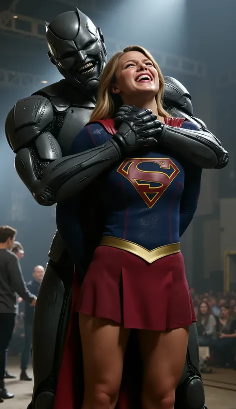 Melissa Benoist as Supergirl, (a very short skirt), both arms behind her back, she is locking by a green lighting locking devices, she is sexual assaulted from behind by Lex Luther the robot, ((painful face)), (Supergirl is crying in pain), Lex Luther is a...